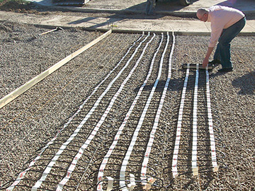 ClearZone heating cable being installed for heated driveway