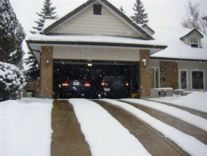 Heated driveway featuring two 24-inch heated tire tracks.